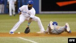 El jugador de Dodgers Yasiel Puig (d) 